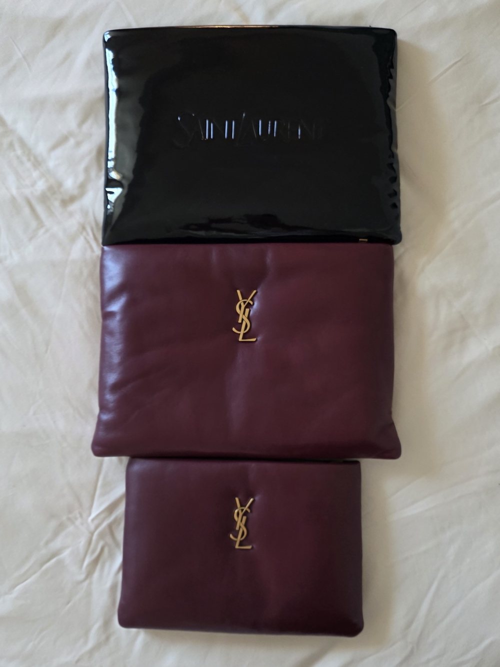 Yves Saint Laurent Leather Puffy Pouches In Liquid Black And Calypso